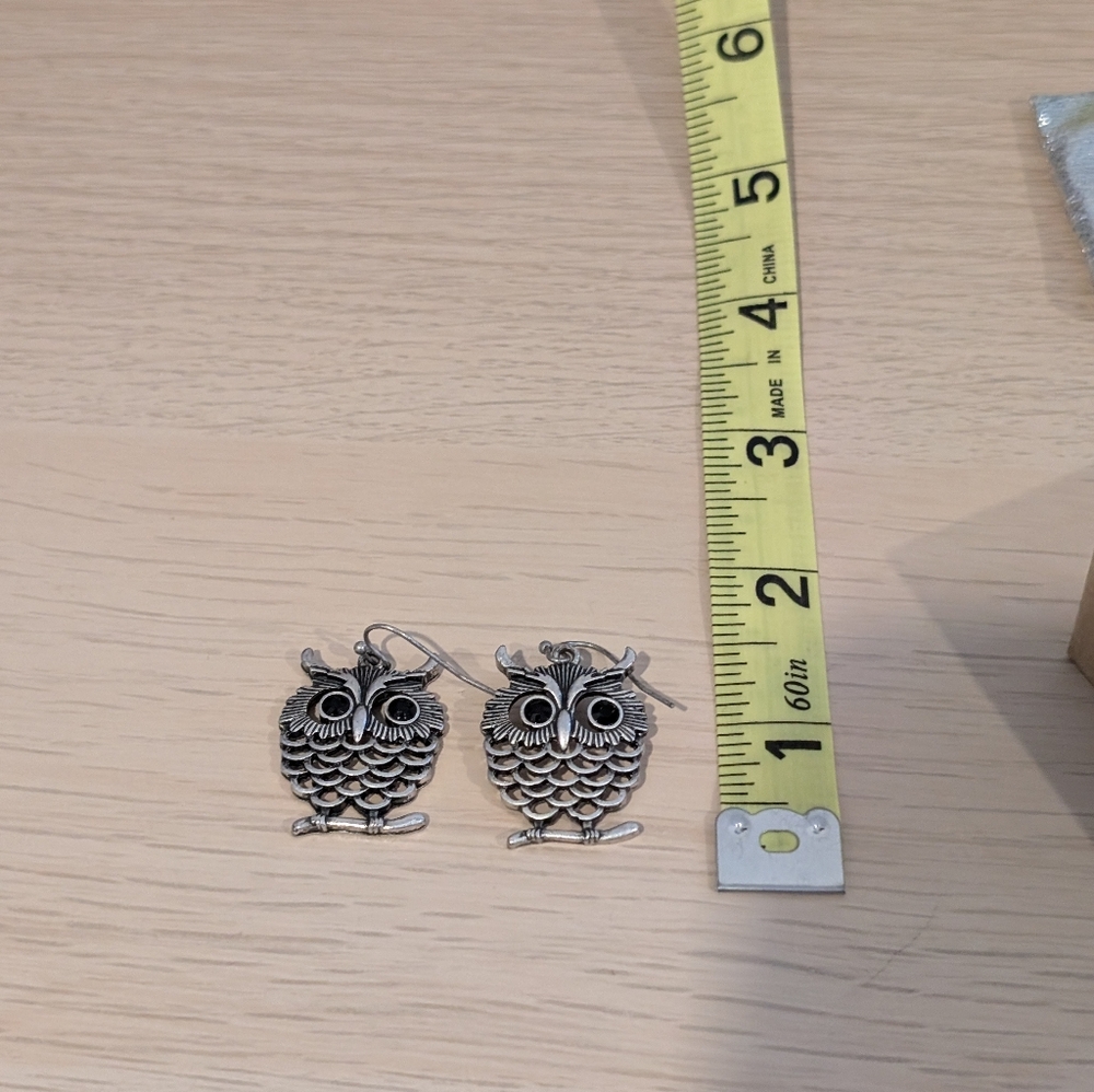 Owl dangling earrings